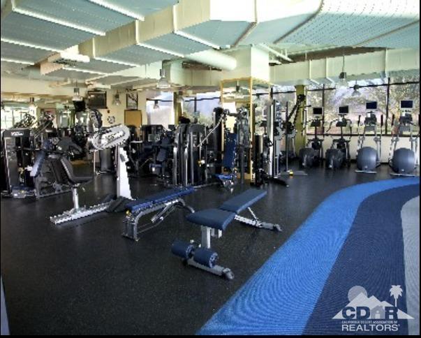 81757 Rustic Canyon Drive La Quinta, CA 92253 - Photo 32 of 40 a view of a room with gym equipment