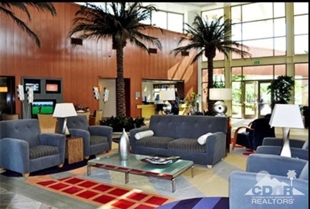 81757 Rustic Canyon Drive La Quinta, CA 92253 - Photo 34 of 40 a living room with furniture and a large window