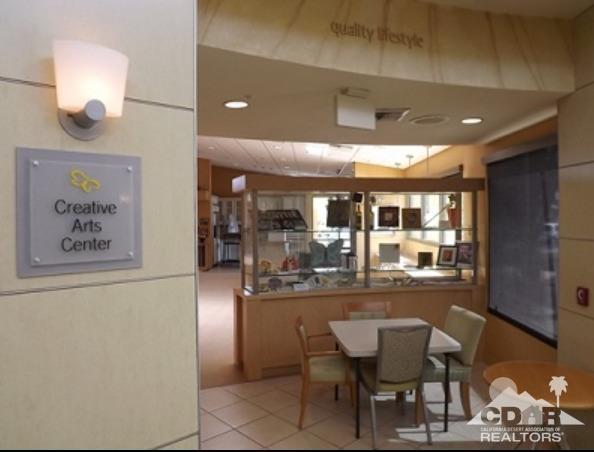 81757 Rustic Canyon Drive La Quinta, CA 92253 - Photo 38 of 40 a dining area with a table and chairs