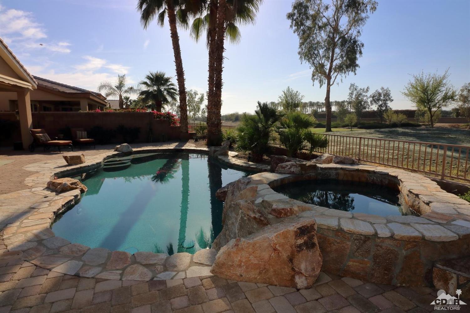 81757 Rustic Canyon Drive La Quinta, CA 92253 - Photo 6 of 40 a view of swimming pool from a lake view