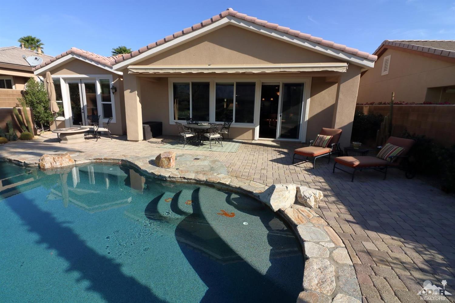 81757 Rustic Canyon Drive La Quinta, CA 92253 - Photo 10 of 40 a view of a dinning table and chairs in patio