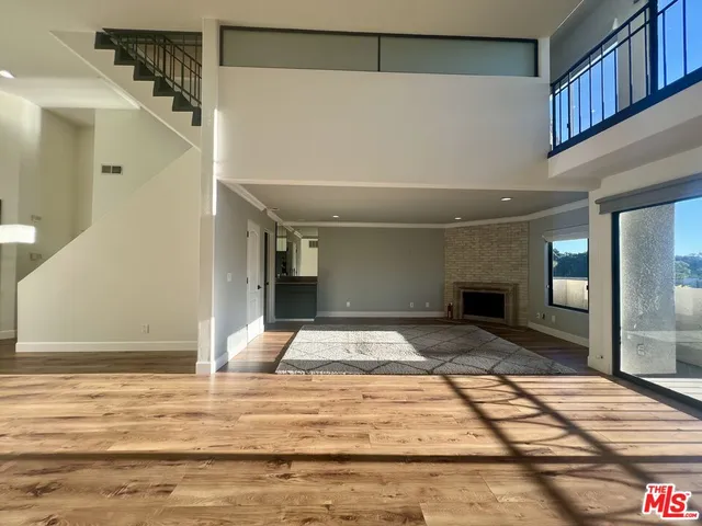a view of livingroom with kitchen
