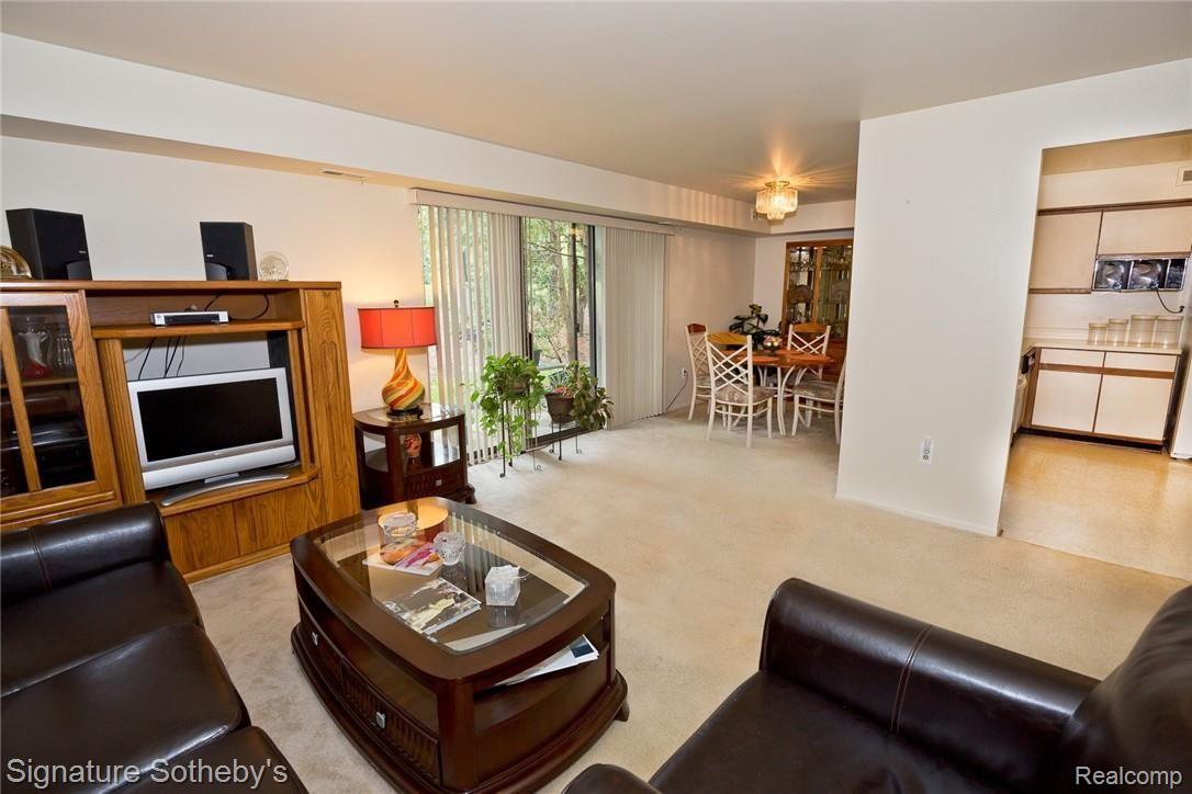 27264 Evergreen Road Southfield, MI 48076 - Photo 4 of 22 Living room to dining room and kitchen