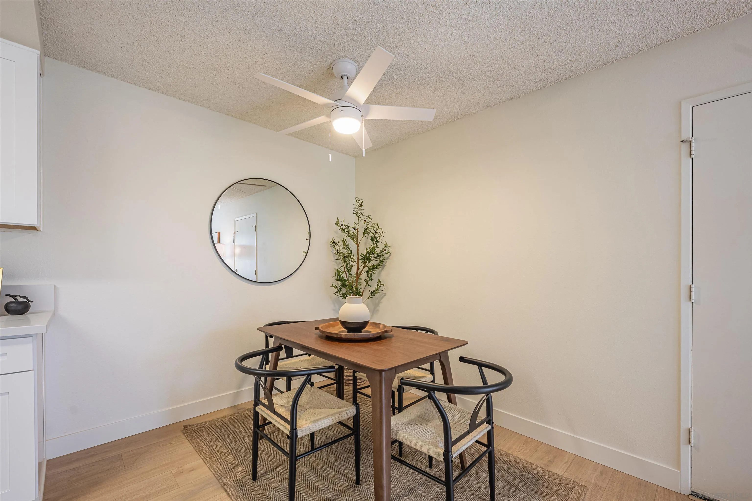 12609 Robison Boulevard, Unit 108 Poway, CA 92064 - Photo 11 of 27 a view of a room with a table and chairs