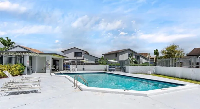 a view of house with outdoor space and sitting space