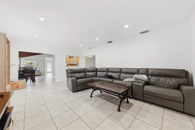 a living room with furniture and a couch