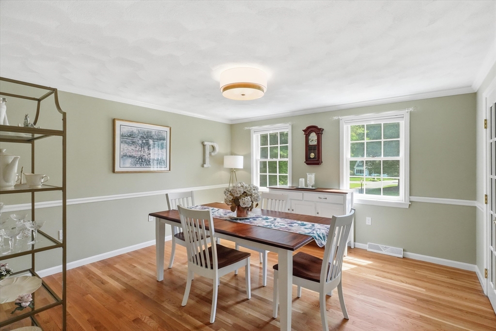 9 Fazio Farm Road Georgetown, MA 01833 - Photo 14 of 42 a view of a dining room with furniture window and wooden floor