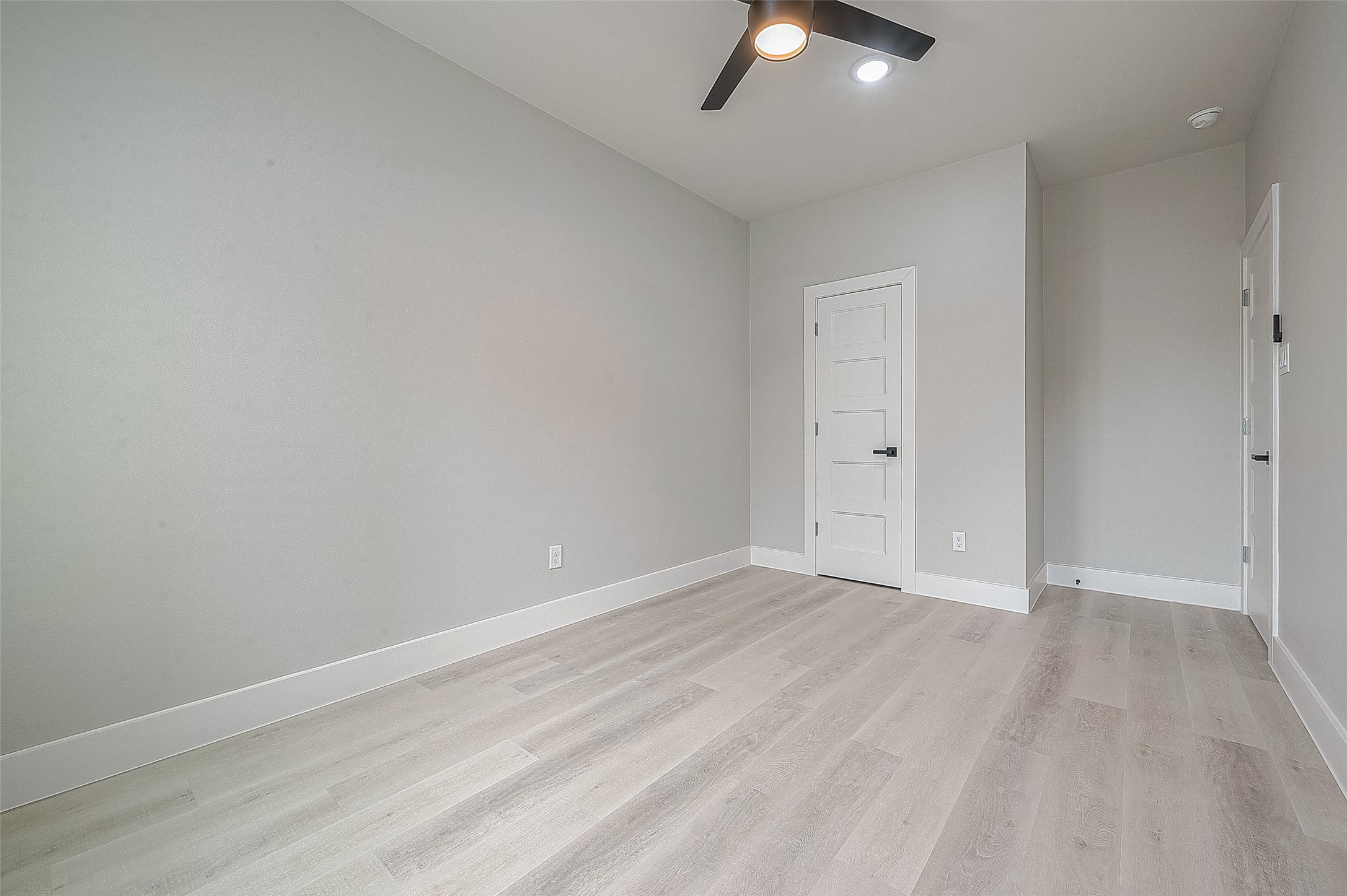 7108 St Augustine Street Houston, TX 77021 - Photo 12 of 21 wooden floor in an empty room