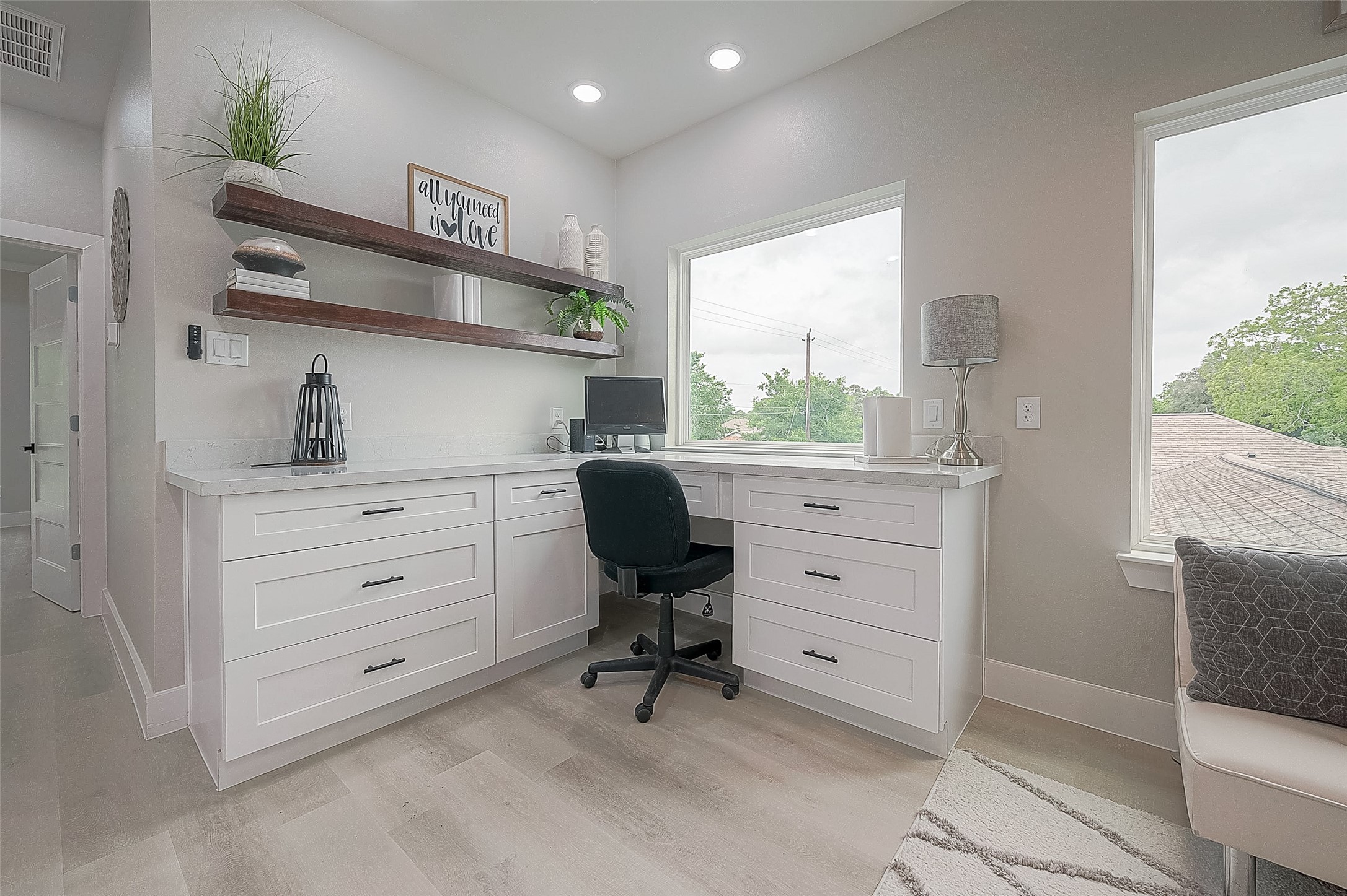 7108 St Augustine Street Houston, TX 77021 - Photo 18 of 21 a view of a workspace with furniture