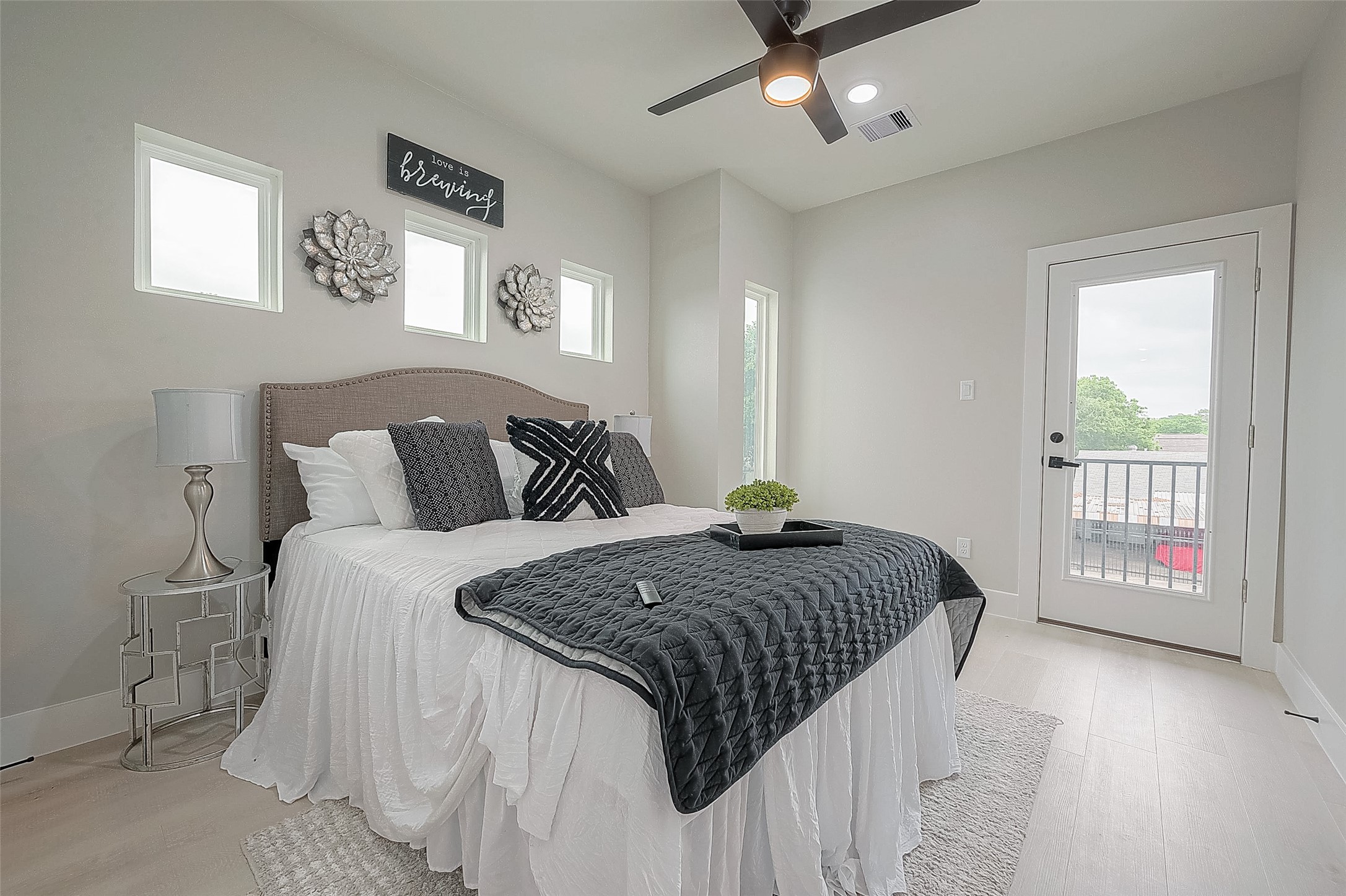 7108 St Augustine Street Houston, TX 77021 - Photo 6 of 21 a bedroom with a bed and glass window