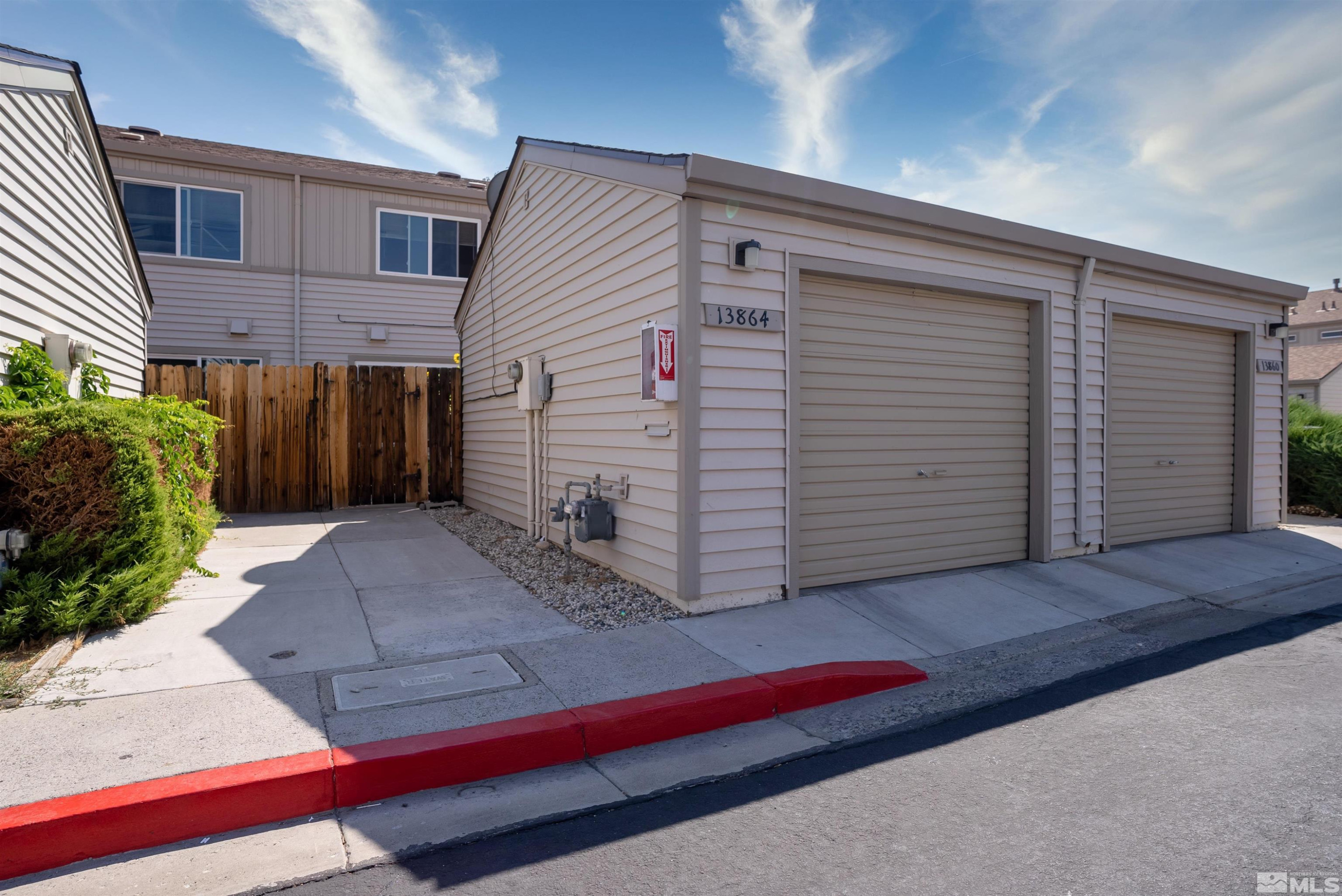 13864 Lear Boulevard Reno, NV 89506 - Photo 1 of 31 a view of a house with a yard