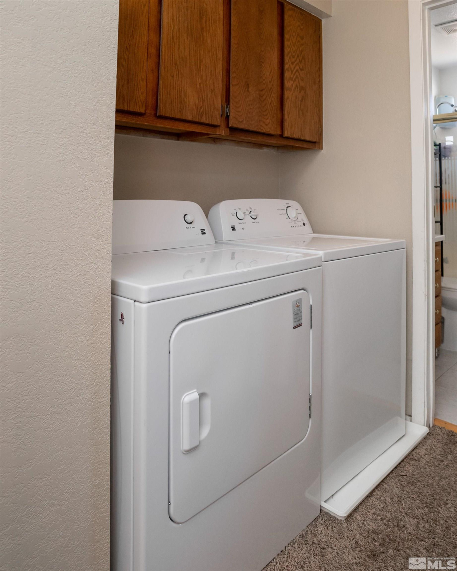 13864 Lear Boulevard Reno, NV 89506 - Photo 20 of 31 a utility room with dryer and washer