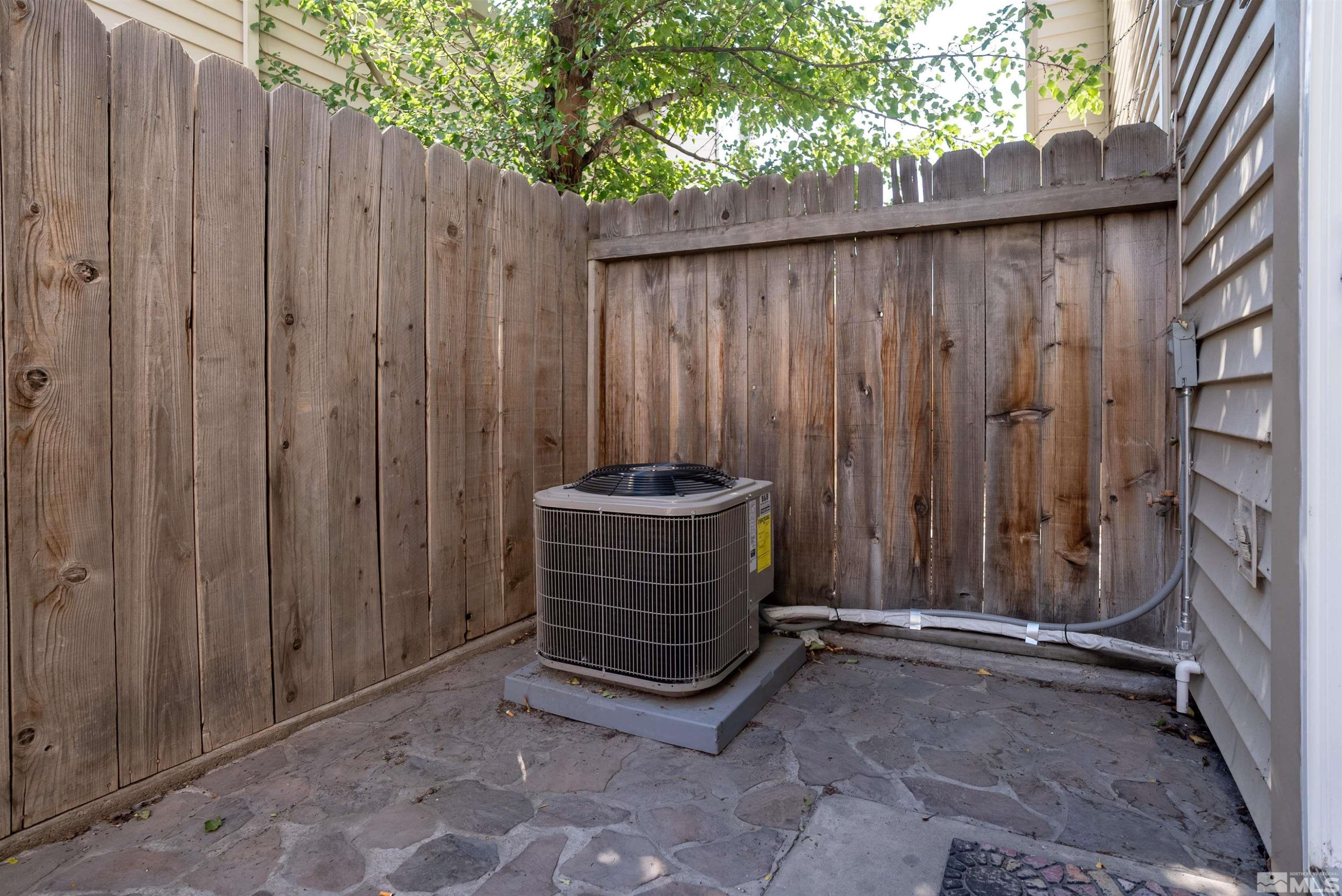 13864 Lear Boulevard Reno, NV 89506 - Photo 28 of 31 a view of outdoor space and wooden fence
