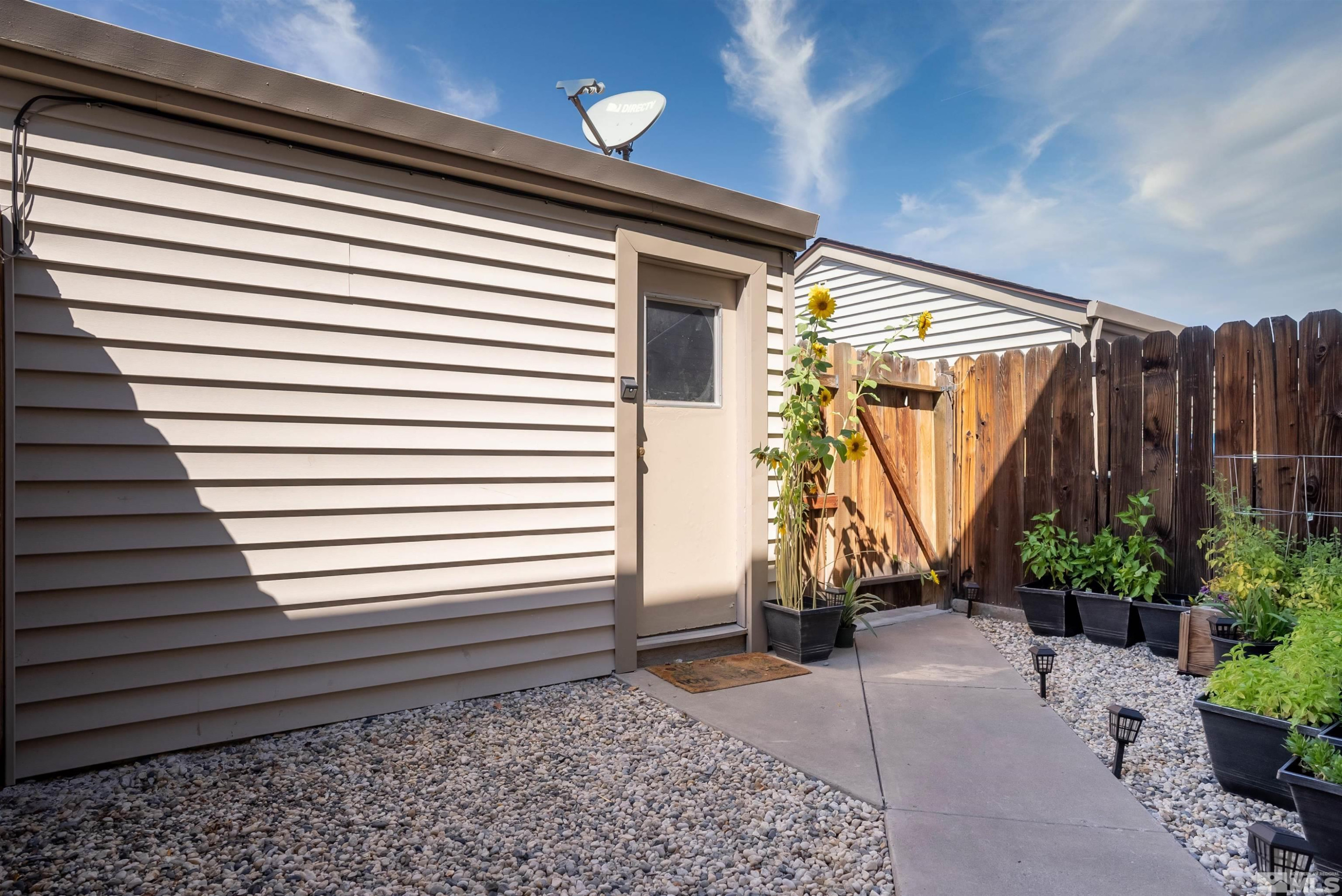 13864 Lear Boulevard Reno, NV 89506 - Photo 31 of 31 a view of a back side of a house