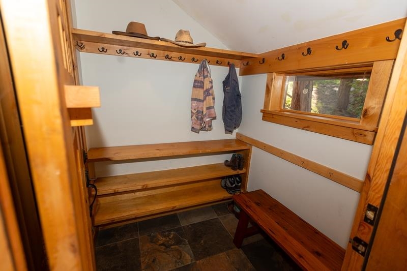 626 Bear Valley Road Loyalton, CA 96118 - Photo 27 of 39 a view of walk in closet with clothes and shoes