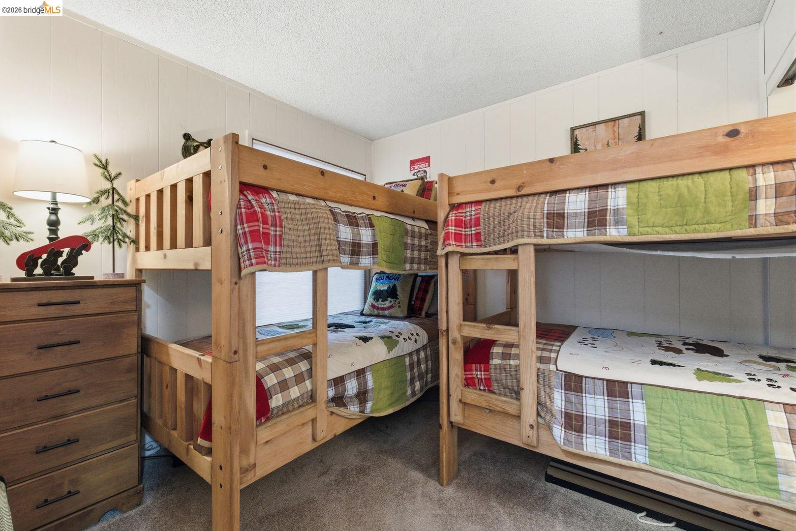 33840 Upper Leland Road, Unit 25A Pinecrest, CA 95364 - Photo 18 of 41 a bedroom with bed and a window