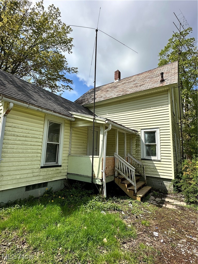6144 Jefferson Road Ashtabula, OH 44004 - Photo 28 of 30 Back of property featuring a chimney