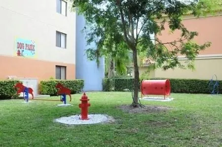 a garden view with a fountain