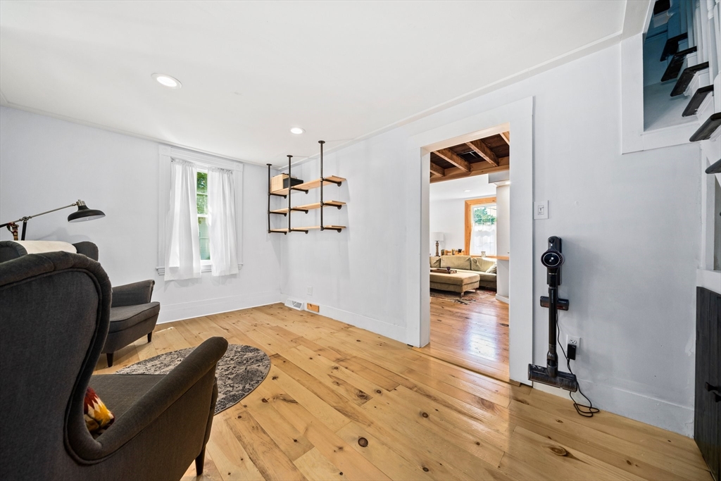 214 Wareham Street Middleboro, MA 02346 - Photo 12 of 37 a bedroom with furniture and a wooden floor