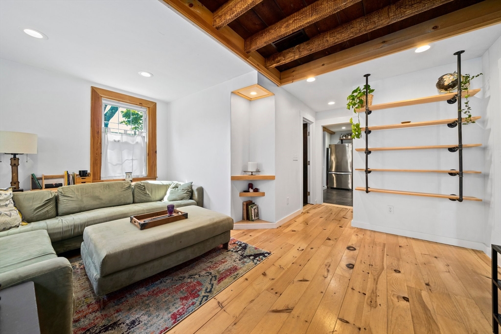 214 Wareham Street Middleboro, MA 02346 - Photo 16 of 37 a living room with furniture and a large window