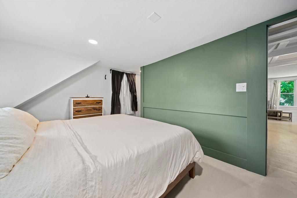 214 Wareham Street Middleboro, MA 02346 - Photo 20 of 37 a bedroom with a bed and a night stand