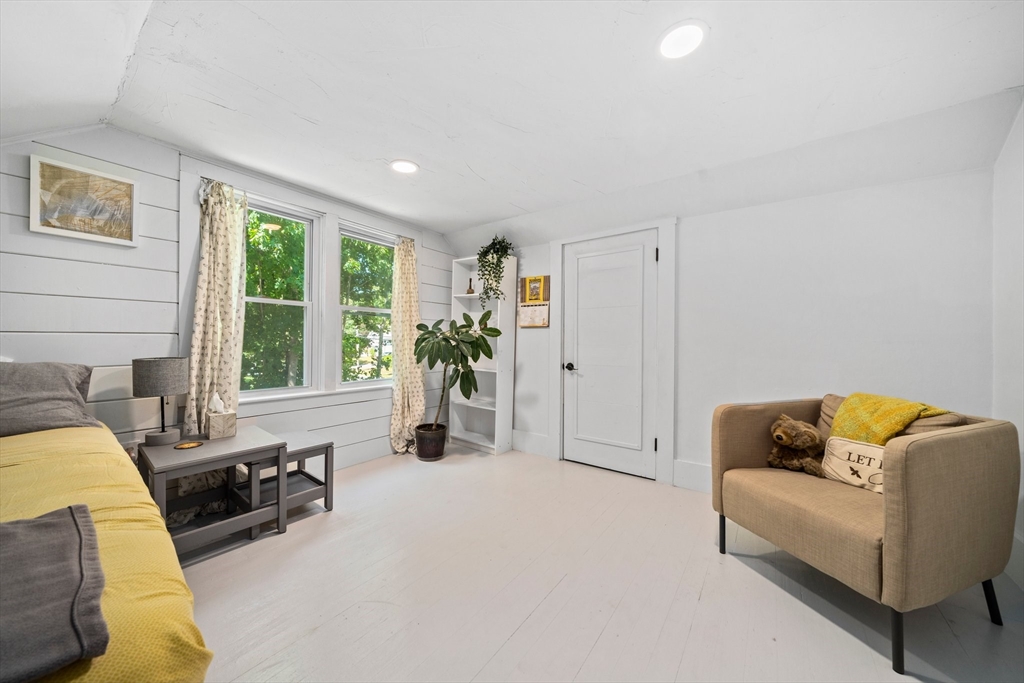 214 Wareham Street Middleboro, MA 02346 - Photo 22 of 37 a living room with furniture and a large window
