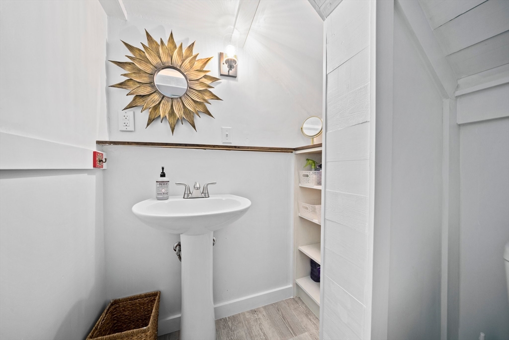 214 Wareham Street Middleboro, MA 02346 - Photo 25 of 37 a bathroom with a sink and a mirror