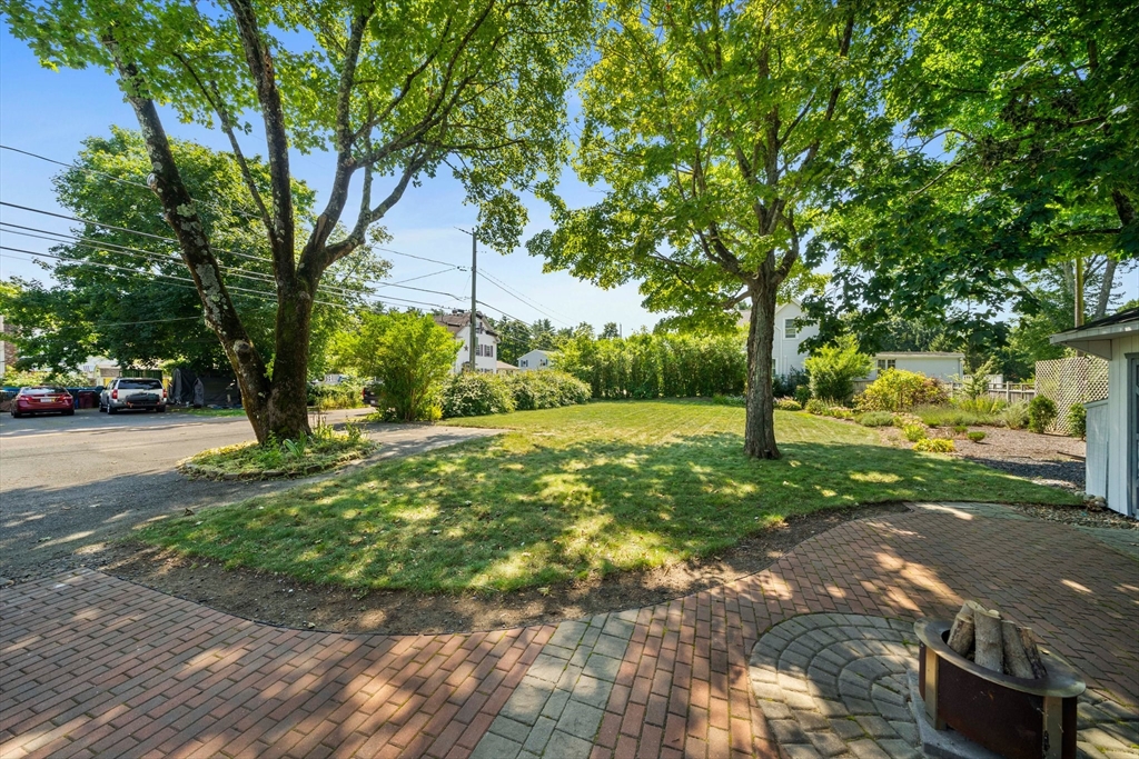 214 Wareham Street Middleboro, MA 02346 - Photo 30 of 37 a view of a yard with plants and trees