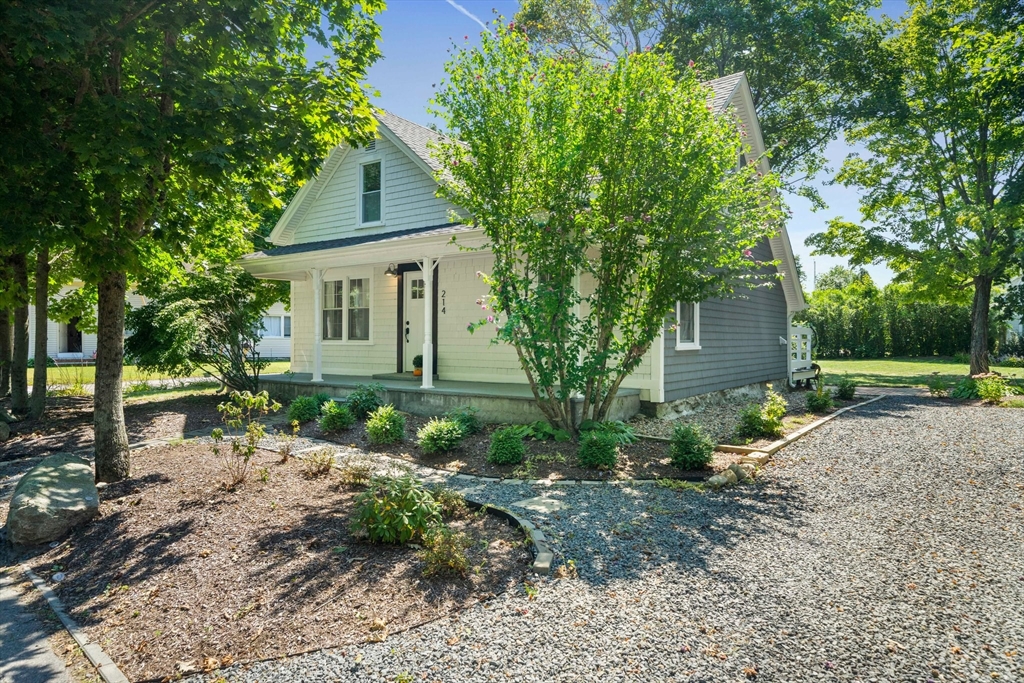 214 Wareham Street Middleboro, MA 02346 - Photo 3 of 37 a front view of a house with garden