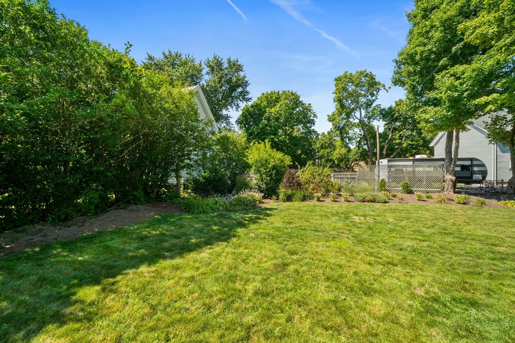 214 Wareham Street Middleboro, MA 02346 - Photo 34 of 37 a backyard of a house with lots of green space