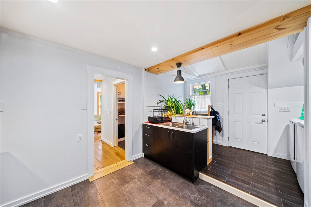 214 Wareham Street Middleboro, MA 02346 - Photo 4 of 37 a kitchen with stainless steel appliances granite countertop a sink and a refrigerator