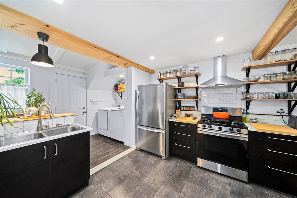 214 Wareham Street Middleboro, MA 02346 - Photo 5 of 37 a kitchen with stainless steel appliances granite countertop a refrigerator and a sink