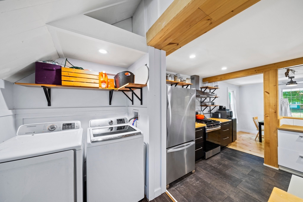 214 Wareham Street Middleboro, MA 02346 - Photo 8 of 37 a view of walk in closet with clothes and shoes