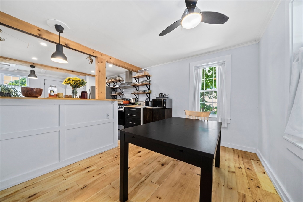 214 Wareham Street Middleboro, MA 02346 - Photo 10 of 37 a kitchen view with stainless steel appliances a stove a chimney a sink and cabinets