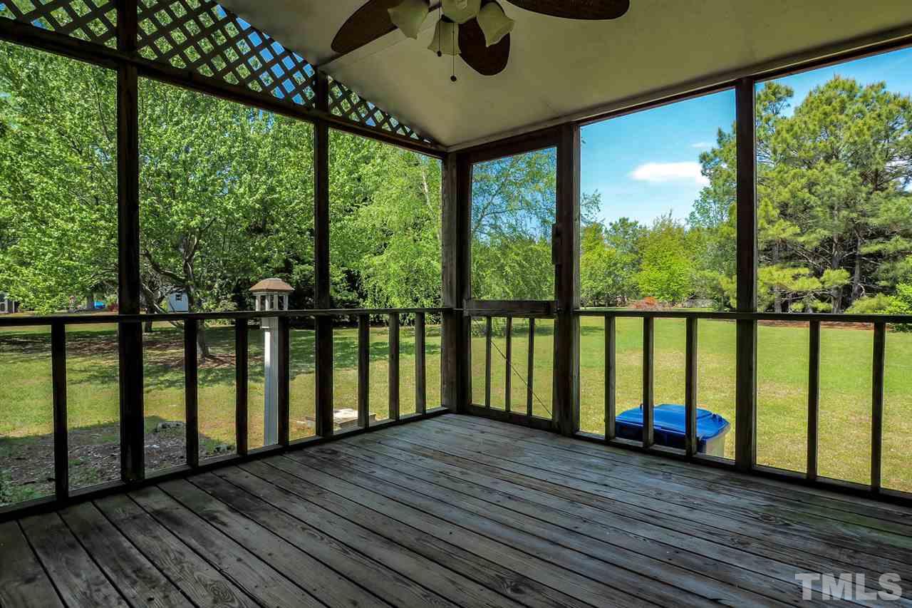 1020 Pagan Road Raleigh, NC 27603 - Photo 20 of 24 a view of a balcony with wooden floor