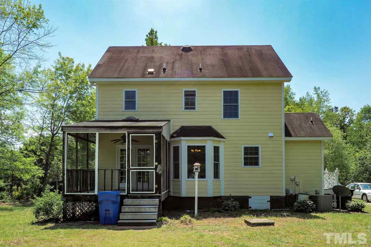 1020 Pagan Road Raleigh, NC 27603 - Photo 21 of 24 a front view of a house with a yard