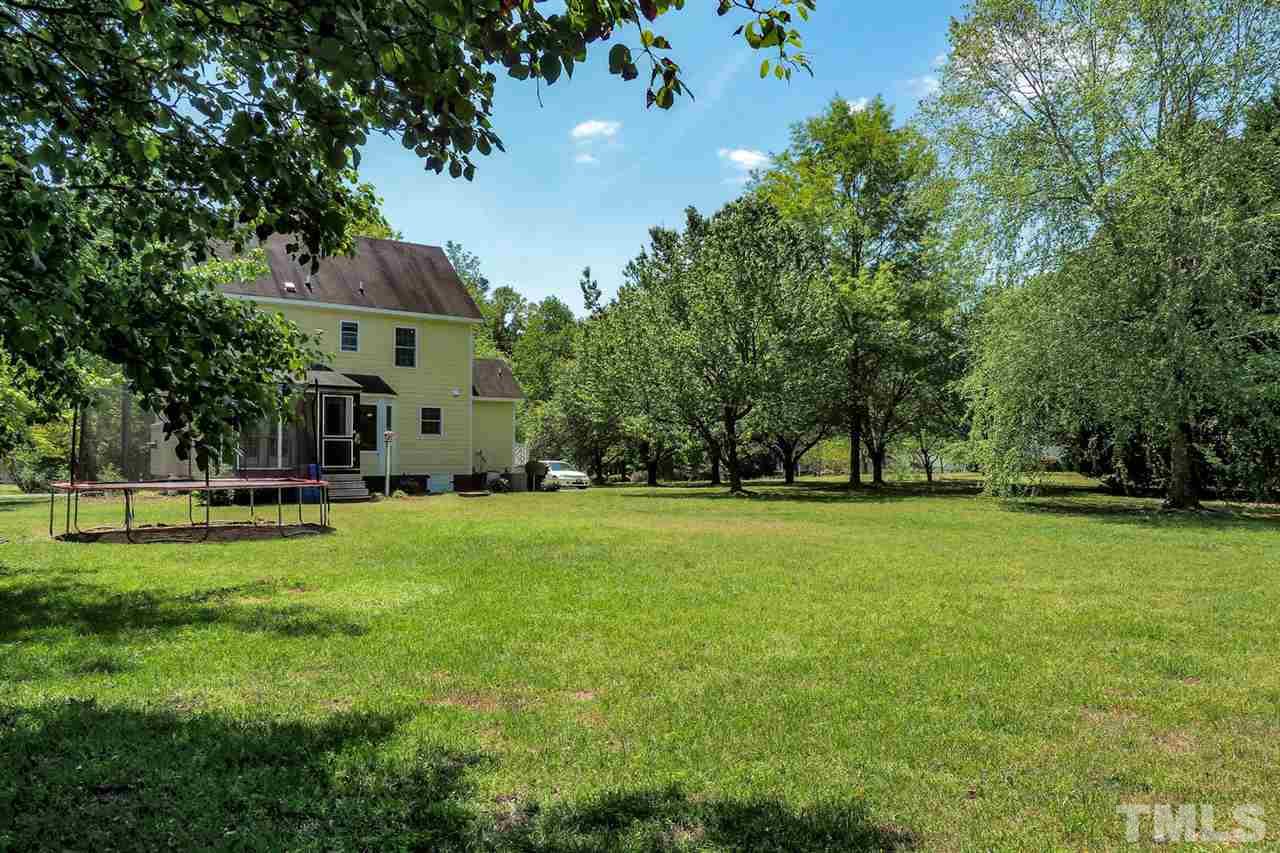 1020 Pagan Road Raleigh, NC 27603 - Photo 24 of 24 a view of a house with a big yard