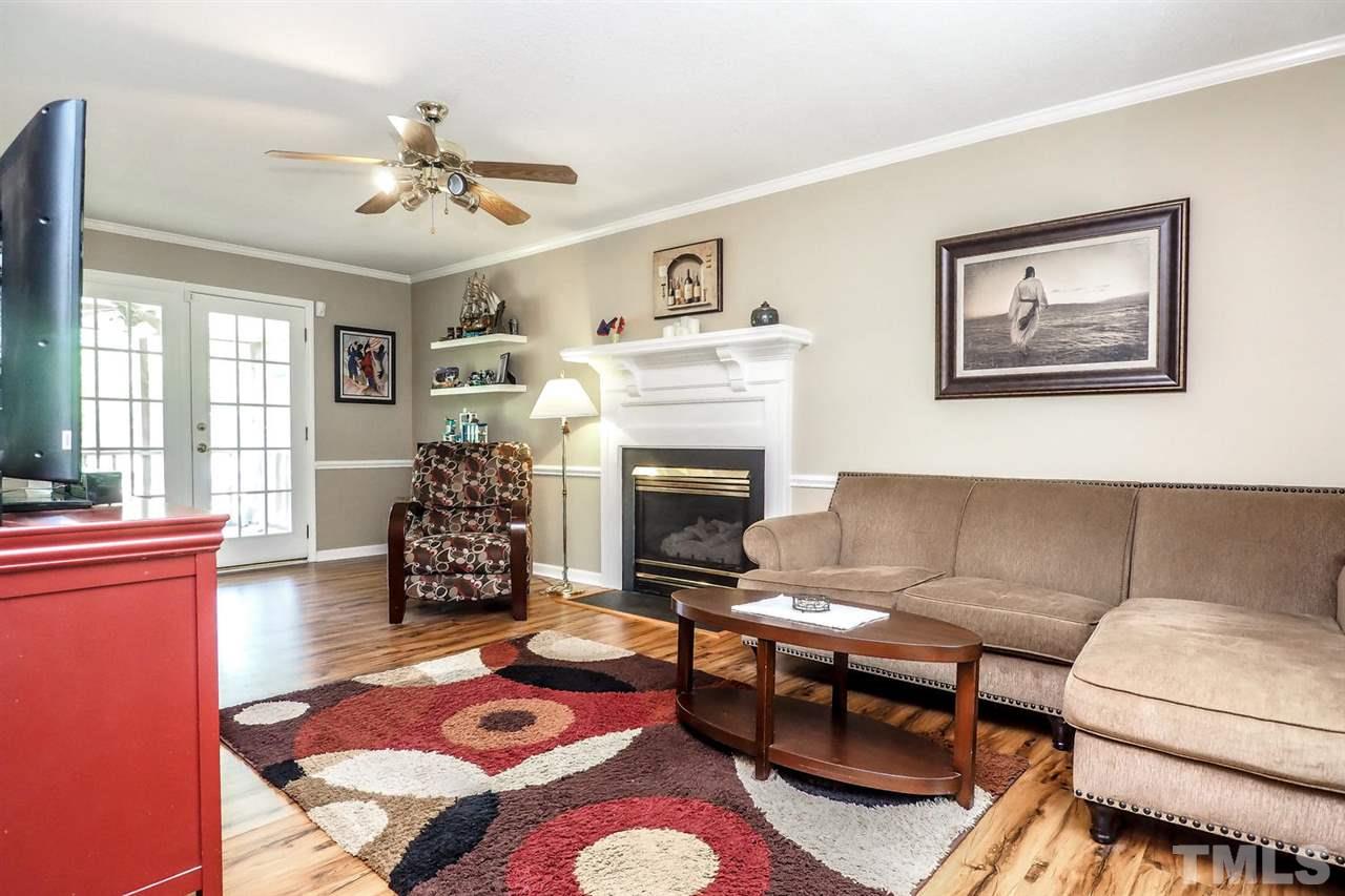 1020 Pagan Road Raleigh, NC 27603 - Photo 4 of 24 a living room with furniture and a fireplace