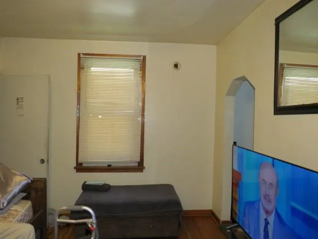 a workspace with furniture and wooden floor