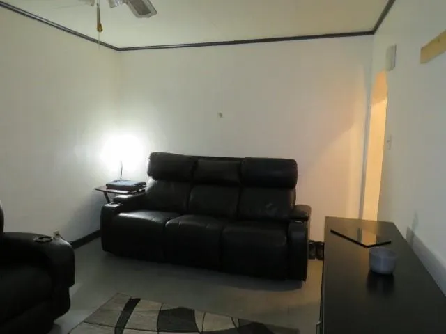 a view of a bathroom from a hallway