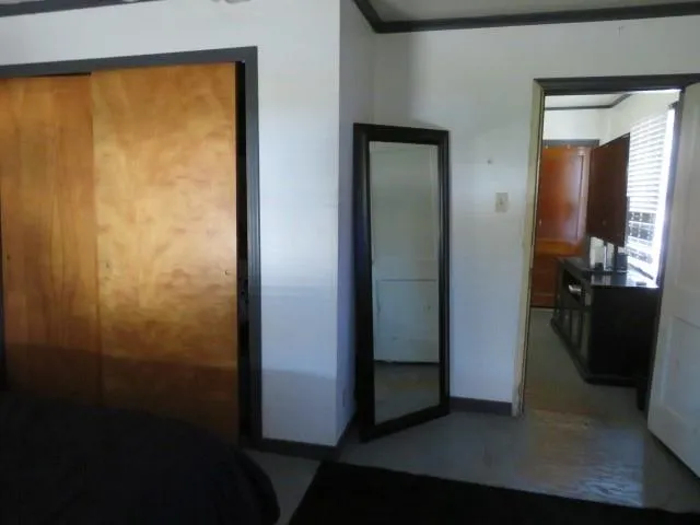 a workspace with furniture and mirror