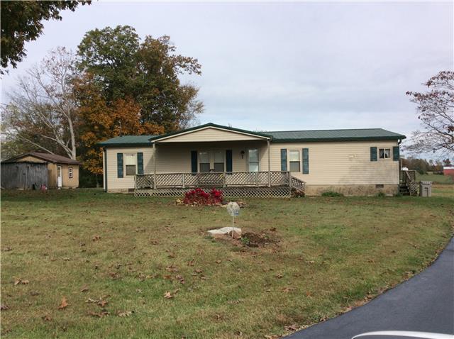1305 Poplar Ridge Road Chapmansboro, TN 37035 - Photo 2 of 14 Nice home on acre lot with paved drive and many extras. Beautiful level lot with mature trees. No backyard neighbors!
