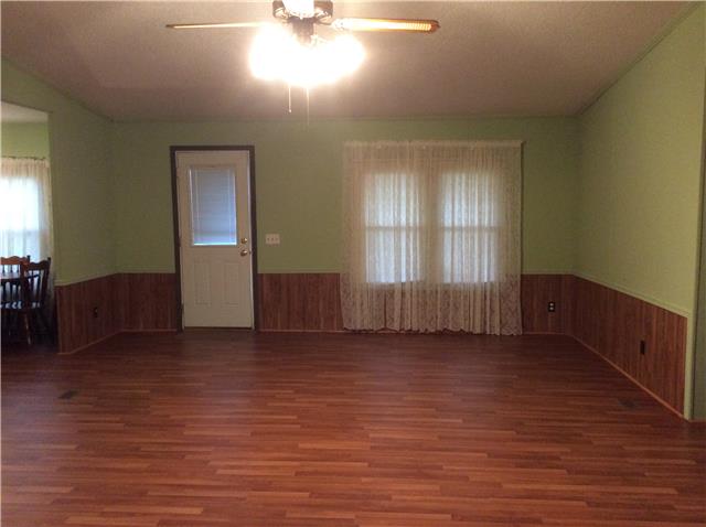 1305 Poplar Ridge Road Chapmansboro, TN 37035 - Photo 6 of 14 Large great room with fireplace.