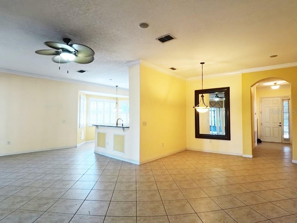 100 Flame Vine Way Groveland, FL 34736 - Photo 11 of 38 a view of an empty room with a window