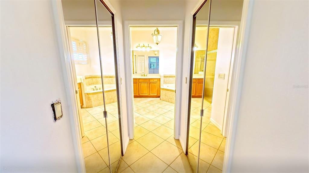 100 Flame Vine Way Groveland, FL 34736 - Photo 19 of 38 a view of a bathroom from a window