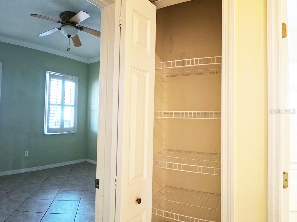 100 Flame Vine Way Groveland, FL 34736 - Photo 23 of 38 a view of a hallway with windows and entryway