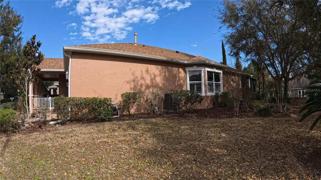 100 Flame Vine Way Groveland, FL 34736 - Photo 30 of 38 a view of a house with a yard