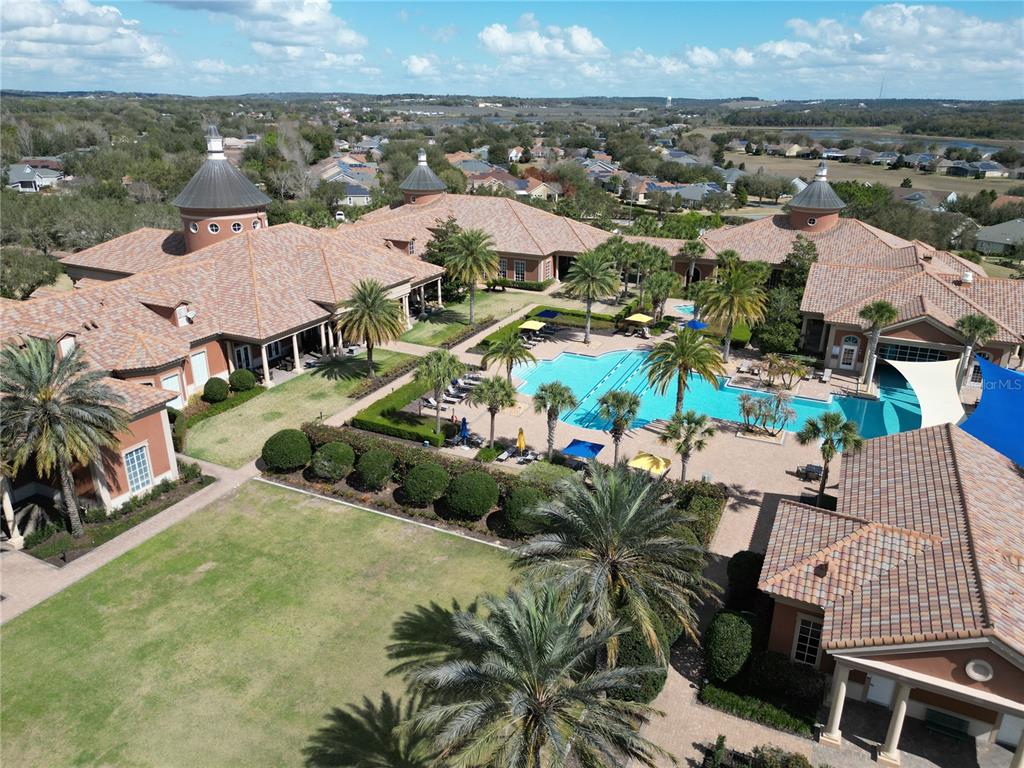 100 Flame Vine Way Groveland, FL 34736 - Photo 36 of 38 an aerial view of residential houses with outdoor space and parking
