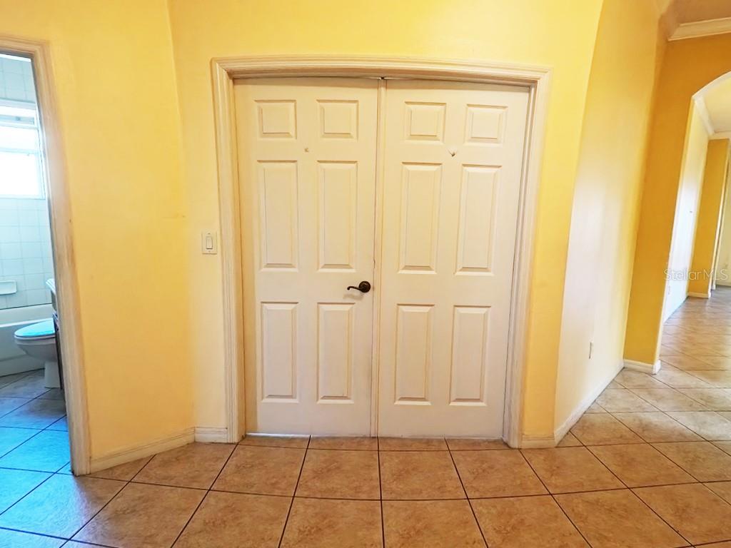100 Flame Vine Way Groveland, FL 34736 - Photo 5 of 38 an empty room with windows