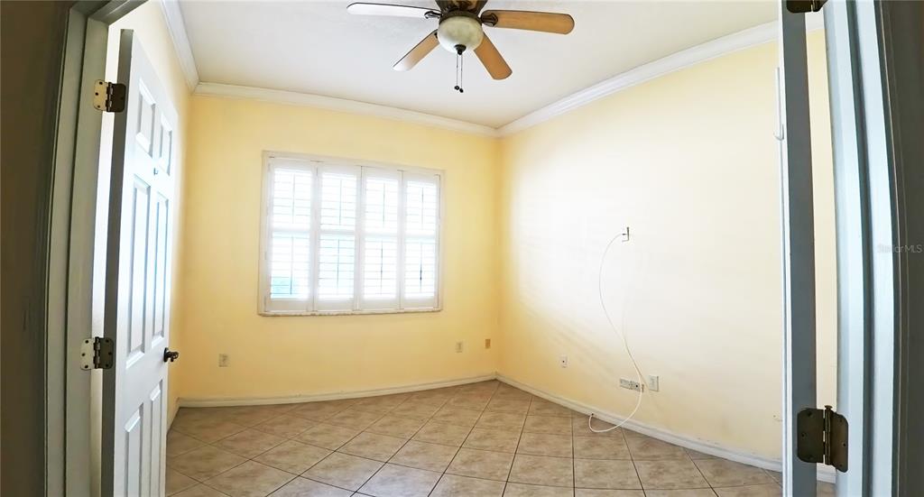 100 Flame Vine Way Groveland, FL 34736 - Photo 6 of 38 a view of an empty room with a window
